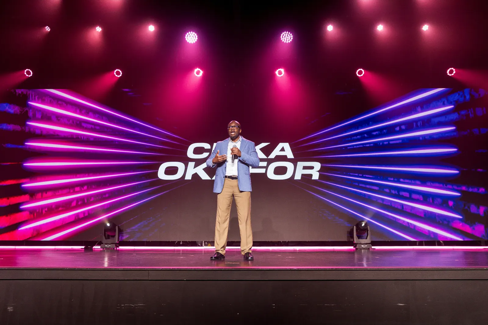 Dr. Chika Okafor speaking on stage